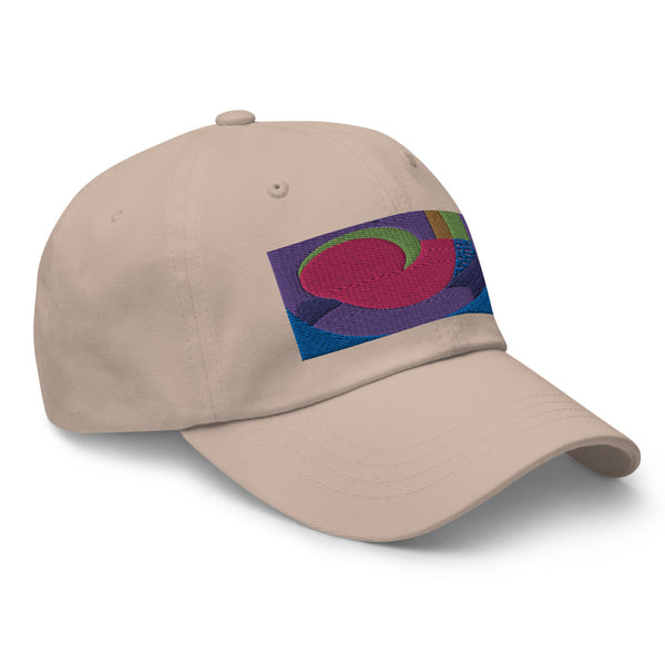 stone dad hat with colorful rectangular logo containing blocks of colors of pink, purple, green and blue, curves and geometric shapes in a mid-century modernist abstract composition