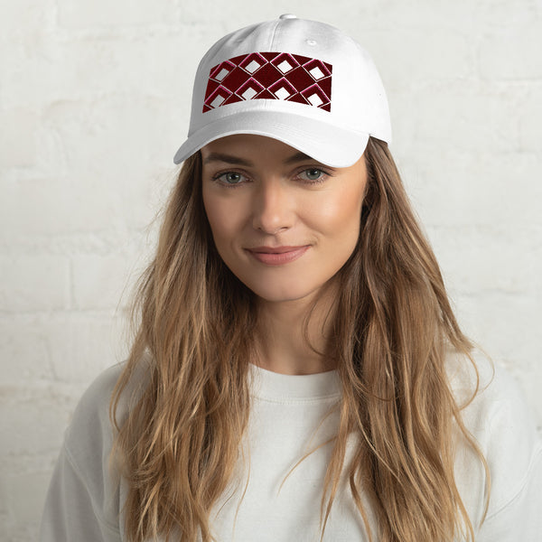 Red diamonds with burgundy and pink tones in this geometric 1960s inspired retro design logo on this dad hat