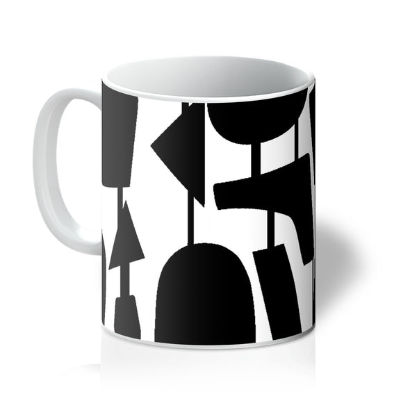This Mid-Century Modern style ceramic coffee mug consists of colorful connected shapes in black on a white background