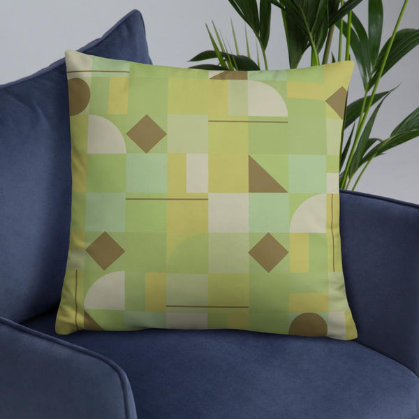 Mustard Mid Century Modern Shapes sofa cushion or throw pillow with a muted yellow geometric pattern design.