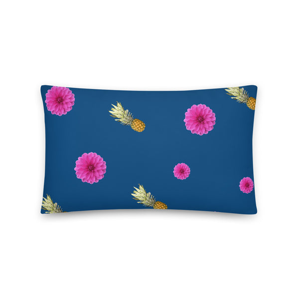 Pink flowers and pineapples patterned cushion or pillow in blue background