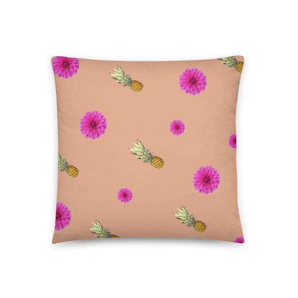 Pink flowers and pineapples patterned cushion or pillow in peach background
