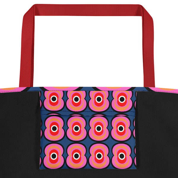 Pink and blue  retro style abstract design beach tote bag with red handle showing inside pocket