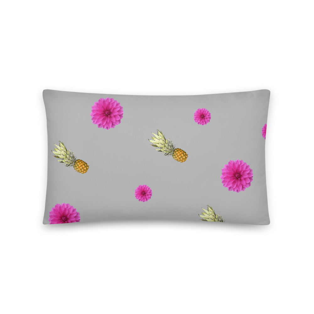 Pink flowers and pineapples patterned cushion or pillow in grey background