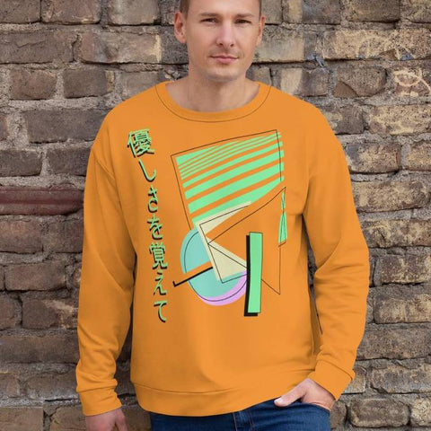 Orange sweatshirt containing a Vaporwave and 80s Memphis style design of overlaid geometric shapes in green, blue, cream and pink and the Japanese script 優しさを覚えて which translates as Remember Kindness by BillingtonPix