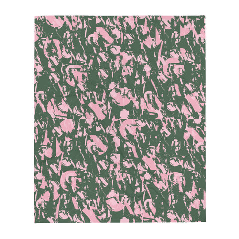 Sage green and pink abstract patterned couch throw blanket with hints of 80s Memphis with subtle polka dots pattern