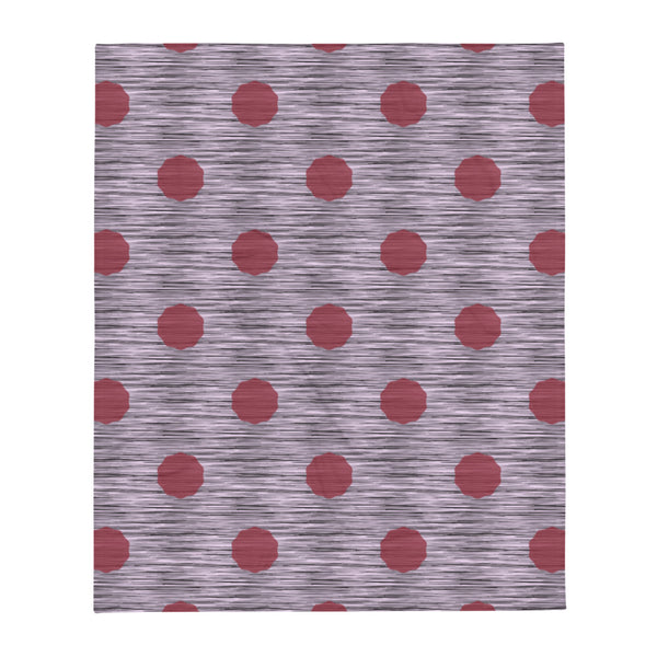 This striking Mid-Century Modern style couch throw design consists of a series of crimson coloured irregular dot shapes against black, grey and pink crisscross design background