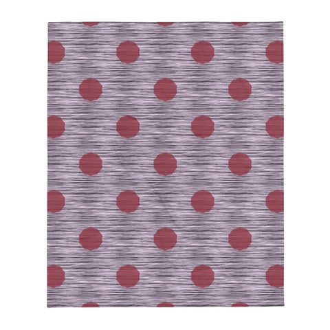 This striking Mid-Century Modern style couch throw design consists of a series of crimson coloured irregular dot shapes against black, grey and pink crisscross design background
