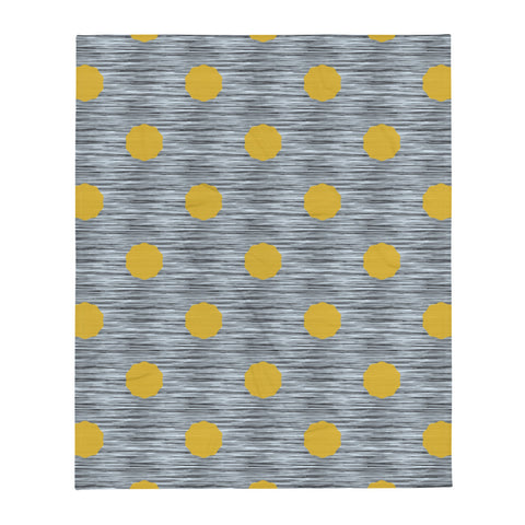 This striking Mid-Century Modern style couch throw design consists of a series of mustard yellow coloured irregular dot shapes against black, grey and blue crisscross design background
