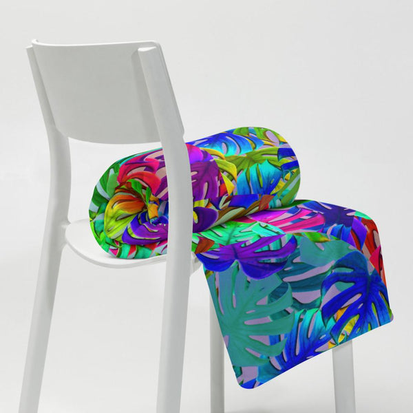 Rainbow colored pattern of circular overlays containing different tones of monstera leaves. Bright, bold and fun and teeming with 80s Memphis style influence. This couch or sofa throw or blanket is perfect for adding a splash of color to your interior design project.