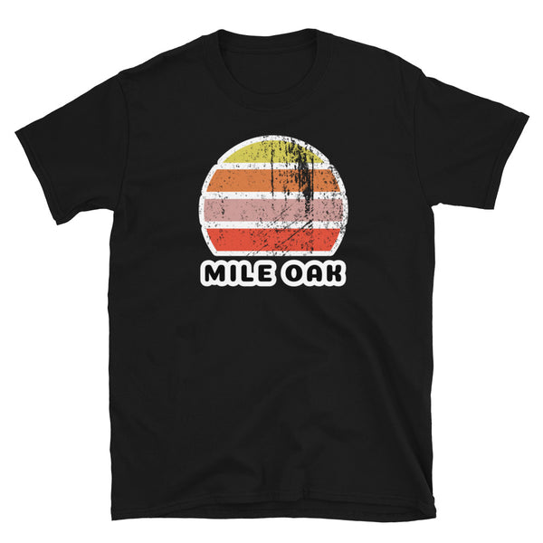 Distressed style abstract retro sunset graphic in yellow, orange, pink and scarlet stripes above the famous Brighton place name of Mile Oak on this black cotton t-shirt
