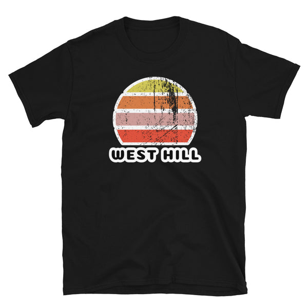 Distressed style abstract retro sunset graphic in yellow, orange, pink and scarlet stripes above the famous Brighton place name of West Hill on this black cotton t-shirt