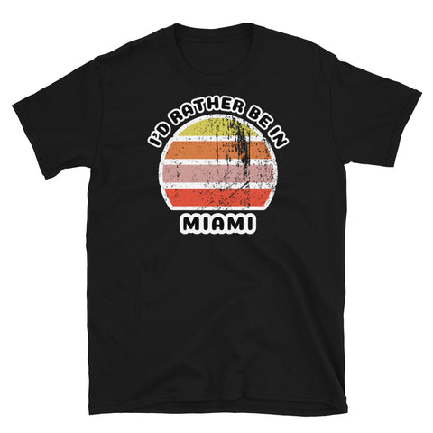 Vintage distressed style abstract retro sunset in yellow, orange, pink and scarlet with the words I'd Rather Be In above and the name Miami beneath on this black cotton t-shirt