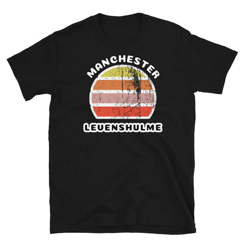 Distressed style abstract retro sunset graphic in yellow, orange, pink and scarlet stripes. The name of Manchester is displayed at the top wrapped around the sunset. Below the retro sunset design is the famous Manchester place name of Levenshulme on this black cotton t-shirt.