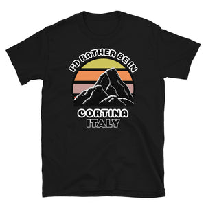 Cortina Italy vintage sunset mountain scene in silhouette, surrounded by the words I'd Rather Be In on top and Cortina, Italy below on this black cotton ski and mountain themed t-shirt