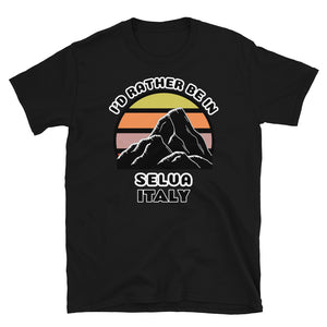 Selva Italy vintage sunset mountain scene in silhouette, surrounded by the words I'd Rather Be In on top and Selva, Italy below on this black cotton ski and mountain themed t-shirt