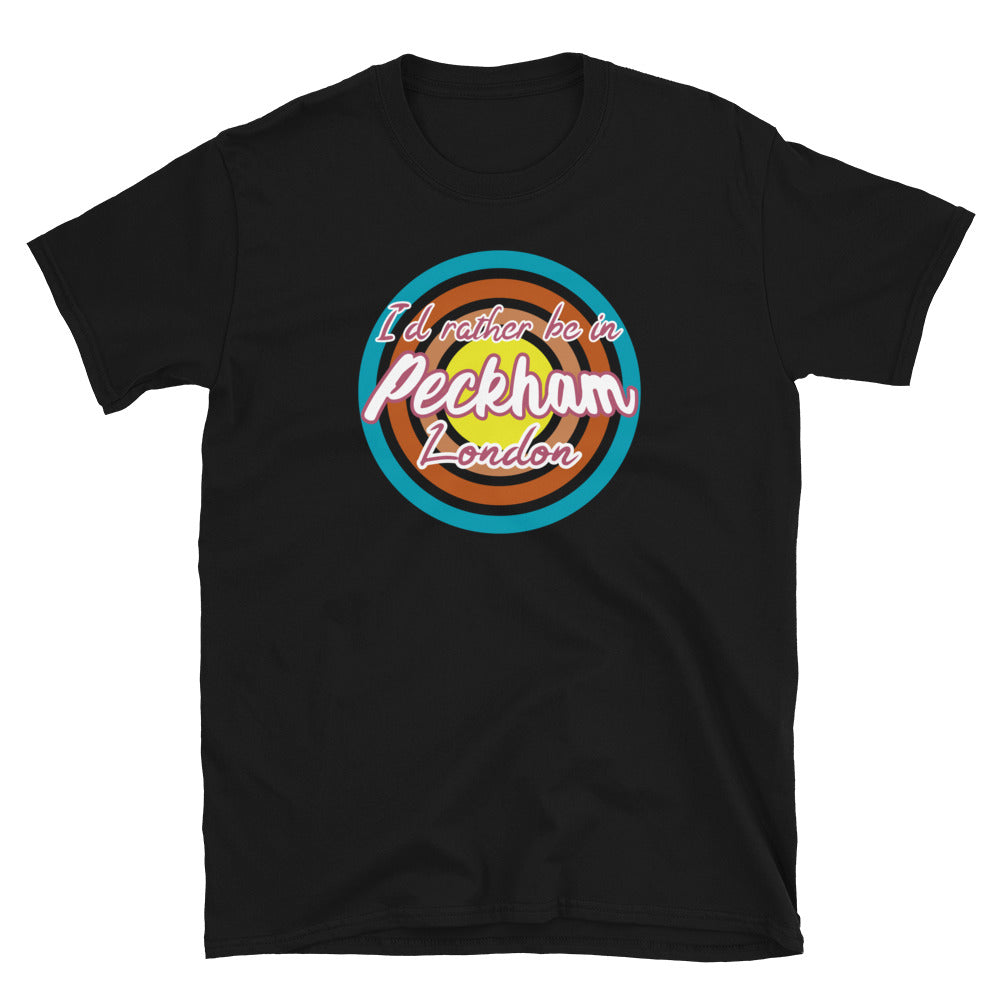 Urban vintage style graphic in turquoise, orange, pink and yellow concentric circles with the slogan I'd rather be in Peckham London across the front in retro style font on this black cotton t-shirt