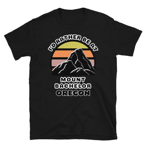 Mount Bachelor Oregon vintage sunset mountain scene in silhouette, surrounded by the words I'd Rather Be At on top and Mount Bachelor, Oregon below on this black cotton ski and mountain themed t-shirt