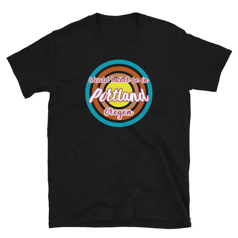 Rather be in Portland Oregon graphic t-shirt design with concentric circles in retro colours of blue, orange, pink and yellow on this black cotton tee by BillingtonPix