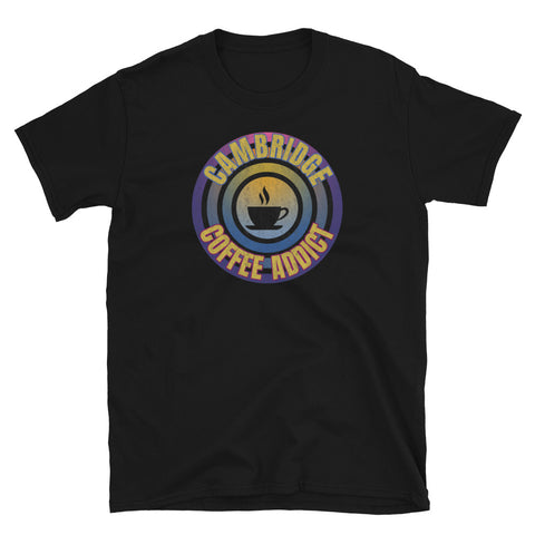 Concentric circular design of retro 80s metallic colours and the slogan Cambridge Coffee Addict with a coffee cup silhouette in the centre. Distressed and dirty style image for a vintage Retrowave look on this black cotton t-shirt by BillingtonPix