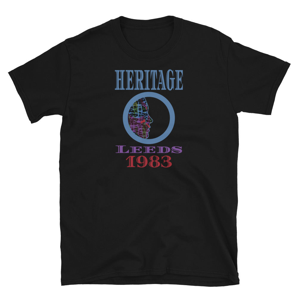 Graphic t-shirt with a patterned profile face in abstract design, tones of blue, green, purple, red, in circular format, with the words Heritage Leeds 1983 in blue, purple and red on this black cotton t-shirt by BillingtonPix