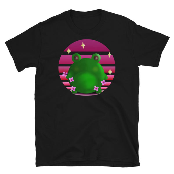 Grumpy green frog stands in front of a pink / purple vintage sunset with blossom and stars on this black cotton graphic t shirt by BillingtonPix 