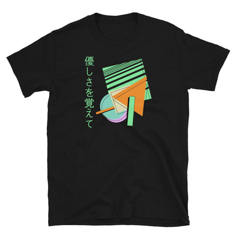 Retro style 90s Vaporwave and 80s Memphis fusion in this cotton t-shirt design by BillingtonPix, featuring geometric shapes in tones of orange, green, blue and mauve with black line shadow overlays. Japanese phrase 優しさを覚えて is written vertically down the left hand side all against a pale grey background to provide a sharp streetwear visual on this black tee. 