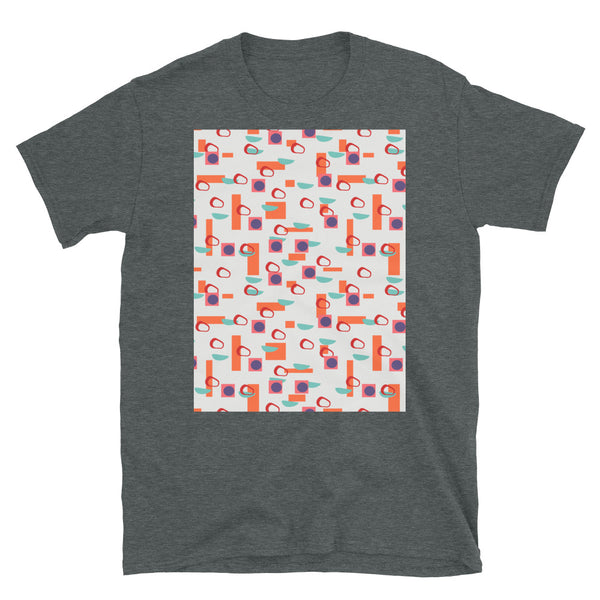 Colorful orange, turquoise, red and purple geometric abstract shapes on a cream background on this Alexander Girard inspired t-shirt