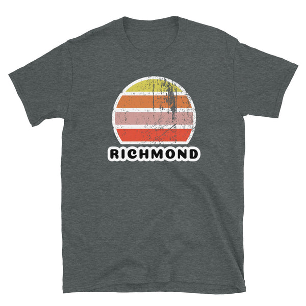 Vintage distressed style abstract retro sunset in yellow, orange, pink and scarlet with the name Richmond beneath on this dark heather t-shirt