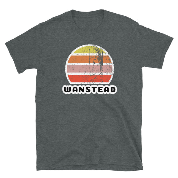 Vintage distressed style abstract retro sunset in yellow, orange, pink and scarlet with the name Wanstead beneath on this dark heather t-shirt