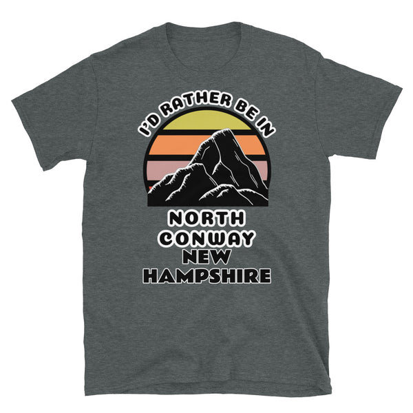 North Conway New Hampshire vintage sunset mountain scene in silhouette, surrounded by the words I'd Rather Be In on top and North Conway New Hampshire below on this dark grey cotton t-shirt