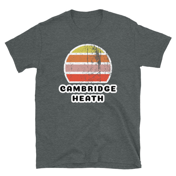 Vintage distressed style retro sunset in yellow, orange, pink and scarlet with the London neighbourhood of Cambridge Heath beneath on this dark grey cotton t-shirt