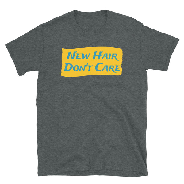 Funny slogan New Hair Don't Care in turquoise font on a splash of orange colour on this dark grey cotton tee