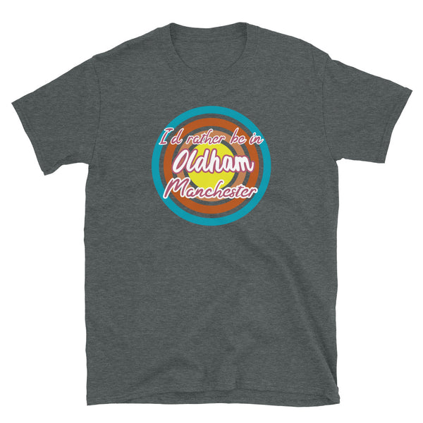 Oldham Manchester urban city vintage style graphic in turquoise, orange, pink and yellow concentric circles with the slogan I'd rather be in Oldham Manchester across the front in retro vintage style font on this dark grey cotton t-shirt