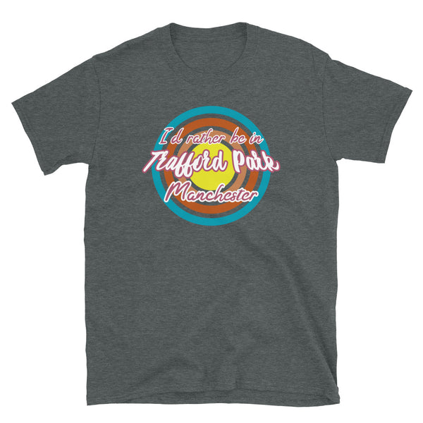 Trafford Park Manchester urban city vintage style graphic in turquoise, orange, pink and yellow concentric circles with the slogan I'd rather be in Trafford Park Manchester across the front in retro style font on this dark grey cotton t-shirt