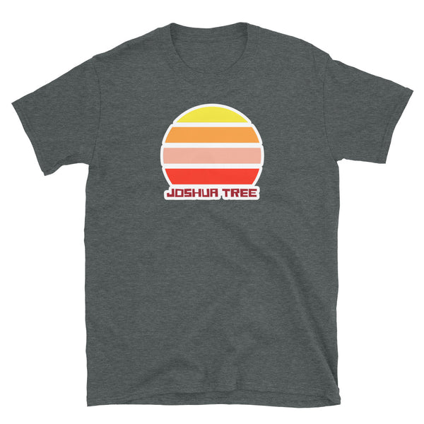 Joshua Tree CA vintage sunset graphic t-shirt with a striped sun in yellow, orange, pink and scarlet and the name Joshua Tree underneath on this dark grey t-shirt