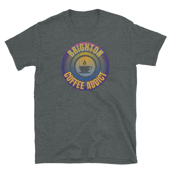 Concentric circular design of retro 80s metallic colours and the slogan Brighton Coffee Addict with a coffee cup silhouette in the centre. Distressed and dirty style image for a vintage Retrowave look on this dark grey cotton t-shirt by BillingtonPix