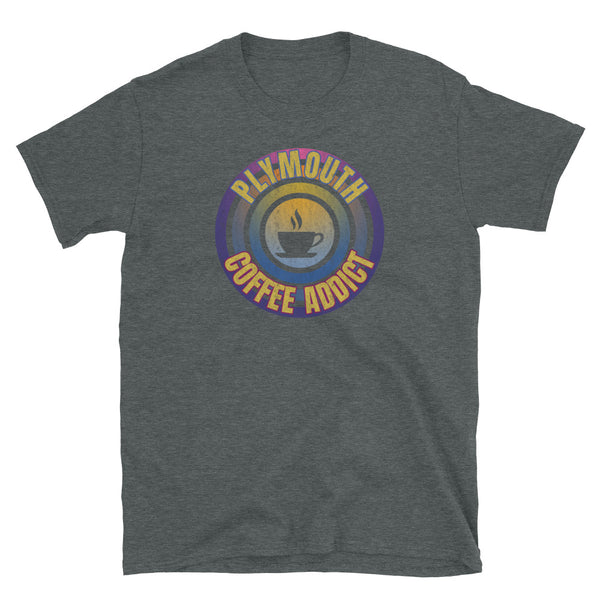 Concentric circular design of retro 80s metallic colours and the slogan Plymouth Coffee Addict with a coffee cup silhouette in the centre. Distressed and dirty style image for a vintage Retrowave look on this dark grey cotton t-shirt by BillingtonPix