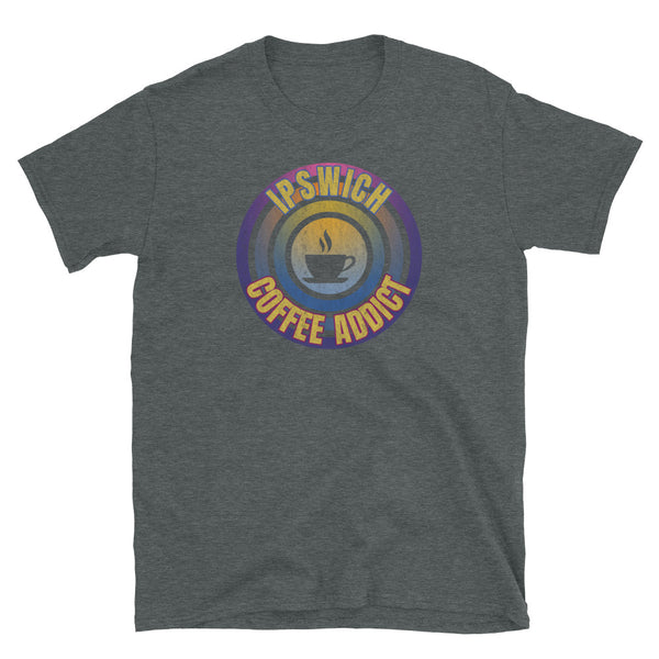 Concentric circular design of retro 80s metallic colours and the slogan Ipswich Coffee Addict with a coffee cup silhouette in the centre. Distressed and dirty style image for a vintage Retrowave look on this dark grey cotton t-shirt by BillingtonPix