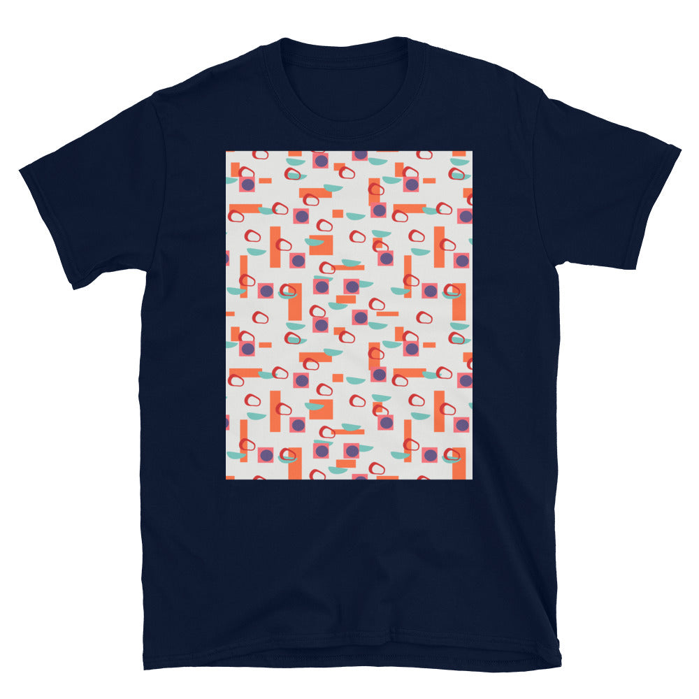 Colorful orange, turquoise, red and purple geometric abstract shapes on a cream background on this Alexander Girard inspired t-shirt