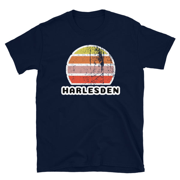 Vintage retro sunset in yellow, orange, pink and scarlet with the name Harlesden beneath on this navy t-shirt