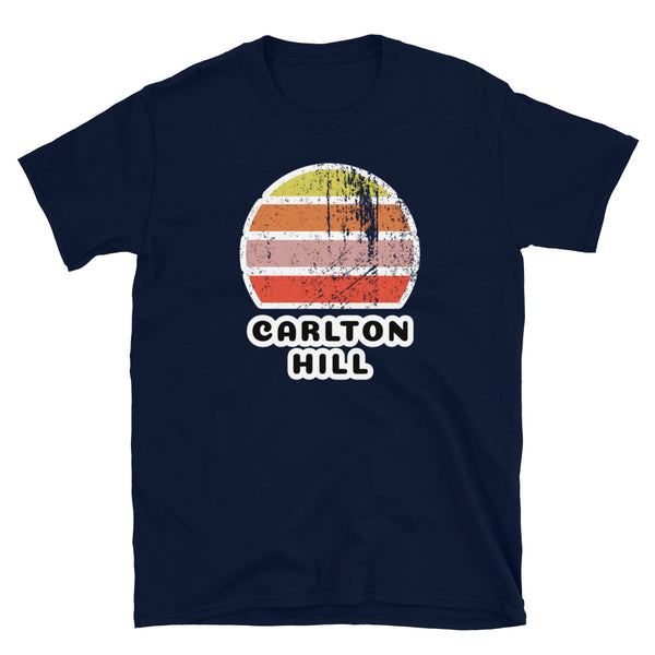 Distressed style abstract retro sunset graphic in yellow, orange, pink and scarlet stripes rising up from the famous Brighton place name of Carlton Hill on this navy cotton t-shirt