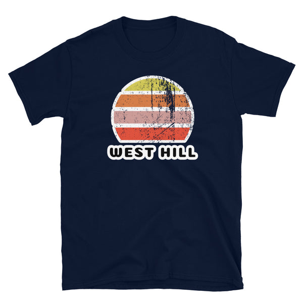 Distressed style abstract retro sunset graphic in yellow, orange, pink and scarlet stripes above the famous Brighton place name of West Hill on this navy cotton t-shirt