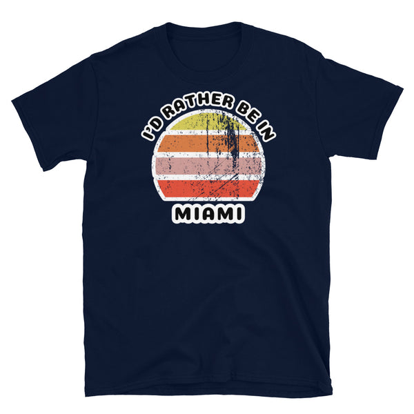 Vintage distressed style abstract retro sunset in yellow, orange, pink and scarlet with the words I'd Rather Be In above and the name Miami beneath on this navy cotton t-shirt