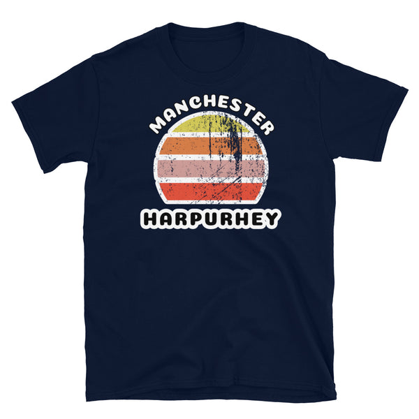 Distressed style abstract retro sunset graphic in yellow, orange, pink and scarlet stripes. The name of Manchester is displayed at the top wrapped around the sunset. Below the retro sunset design is the famous Manchester place name of Harpurhey on this navy cotton t-shirt.