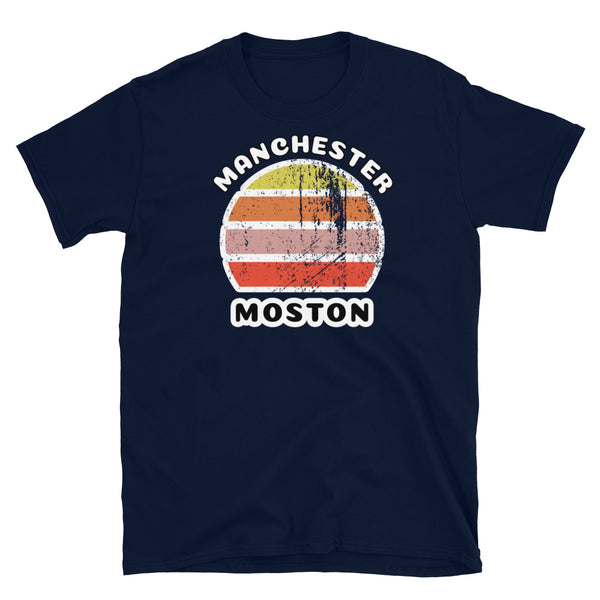 Distressed style abstract retro sunset graphic in yellow, orange, pink and scarlet stripes. The name of Manchester is displayed at the top wrapped around the sunset. Below the retro sunset design is the famous Manchester place name of Moston on this navy cotton t-shirt.