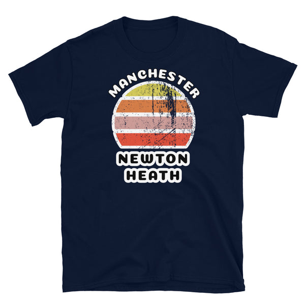 Distressed style abstract retro sunset graphic in yellow, orange, pink and scarlet stripes. The name of Manchester is displayed at the top wrapped around the sunset. Below the retro sunset design is the famous Manchester place name of Newton Heath on this navy cotton t-shirt.