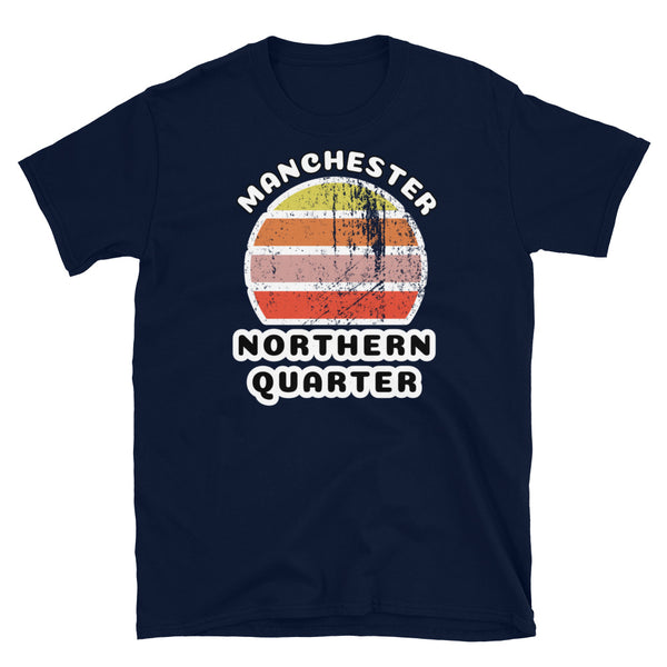 Distressed style abstract retro sunset graphic in yellow, orange, pink and scarlet stripes. The name of Manchester is displayed at the top wrapped around the sunset. Below the retro sunset design is the famous Manchester place name of Northern Quarter on this navy cotton t-shirt.