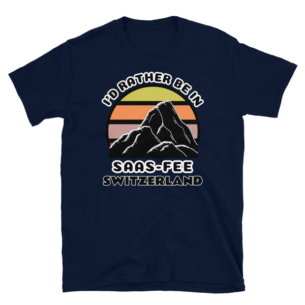 Saas Fee Switzerland vintage sunset mountain scene in silhouette, surrounded by the words I'd Rather Be In on top and Saas-Fee, Switzerland below on this navy cotton ski and mountain themed t-shirt