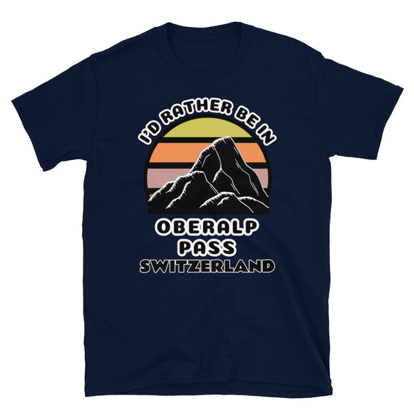 Oberalp Pass Switzerland vintage sunset mountain scene in silhouette, surrounded by the words I'd Rather Be In on top and Oberalp Pass, Switzerland below on this navy cotton ski and mountain themed t-shirt